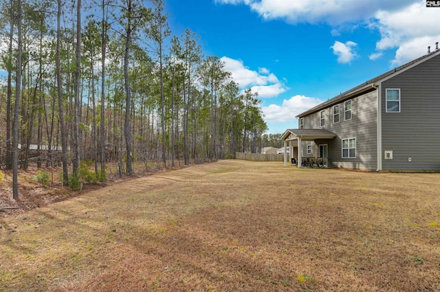 view of yard with fence