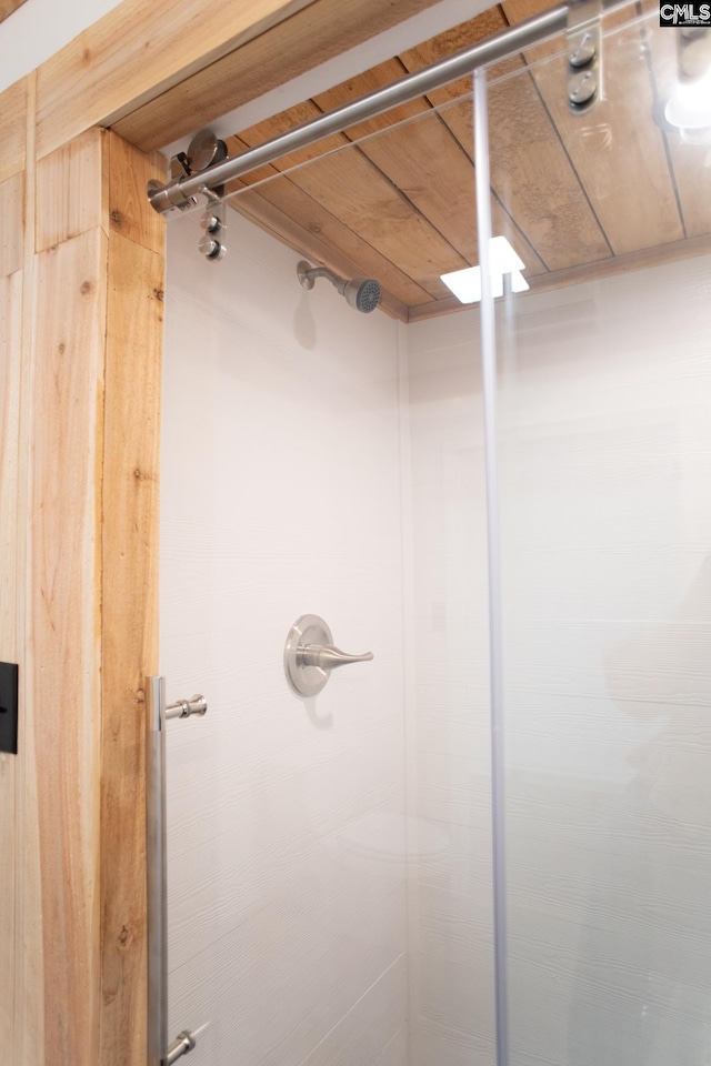 bathroom with a shower stall