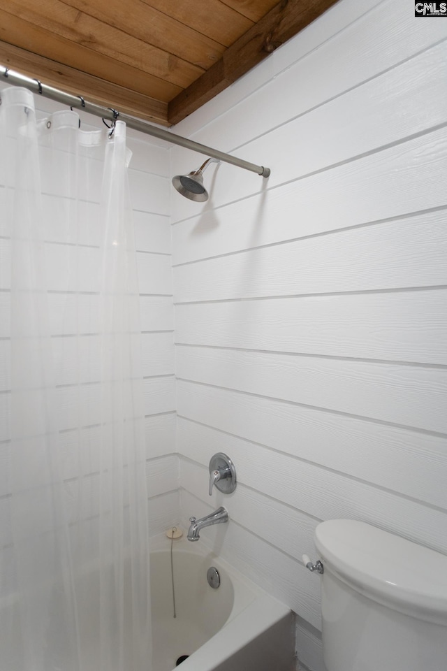 bathroom with toilet, wooden ceiling, and shower / tub combo with curtain