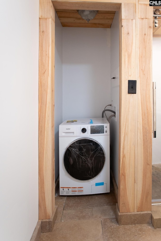 laundry room with washer / dryer and laundry area