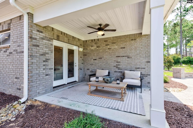 view of patio with a ceiling fan and french doors