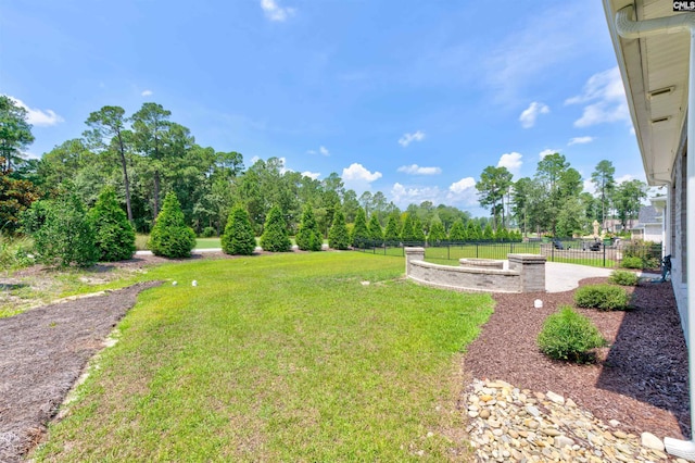 view of yard with fence