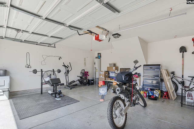 garage with water heater and a garage door opener