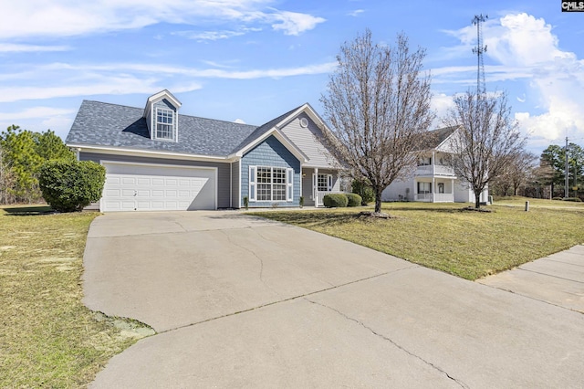 view of front of house with a garage, driveway, a shingled roof, and a front yard