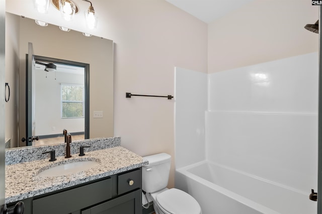 full bathroom featuring vanity and toilet