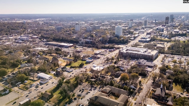 birds eye view of property with a view of city