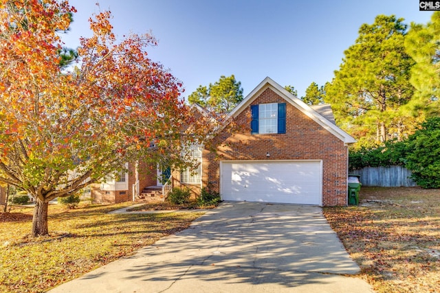 view of front facade featuring crawl space, brick siding, driveway, and fence