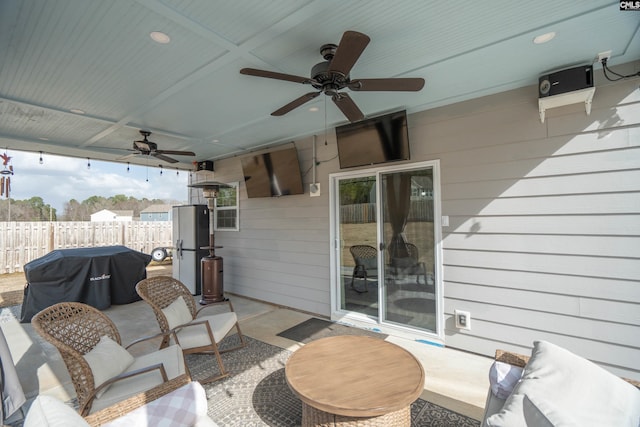 view of patio / terrace with ceiling fan, outdoor lounge area, a grill, and fence