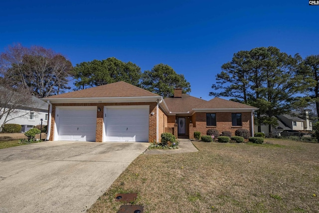 single story home featuring brick siding, a chimney, concrete driveway, an attached garage, and a front yard