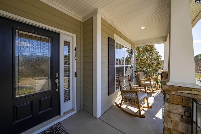 doorway to property with a porch