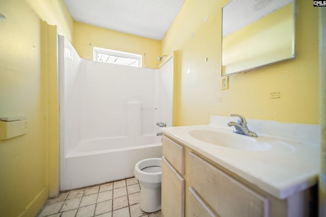 bathroom featuring toilet, tile patterned floors,  shower combination, a textured ceiling, and vanity