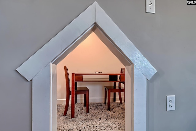 bonus room featuring carpet floors and vaulted ceiling