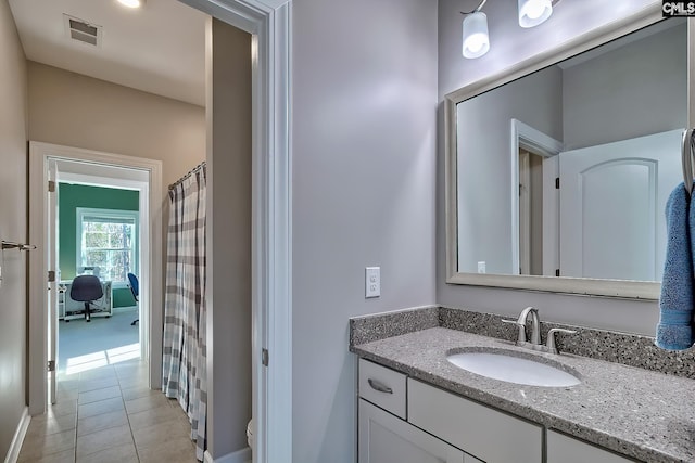 full bath featuring toilet, tile patterned floors, visible vents, and vanity