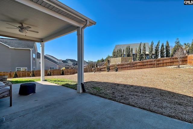 view of patio / terrace with ceiling fan and a fenced backyard