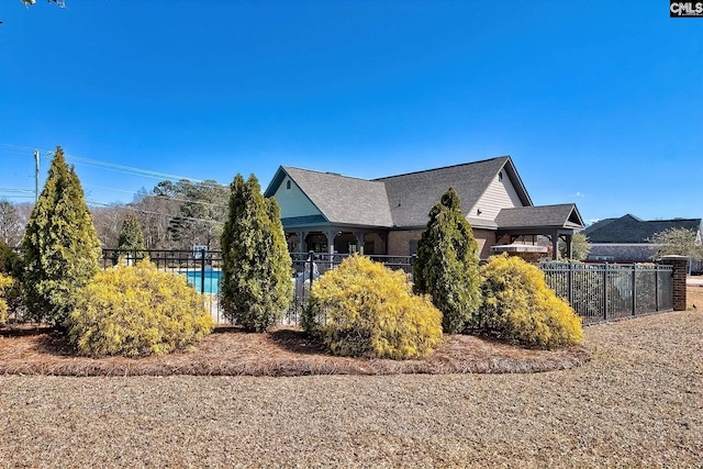 view of home's exterior with fence