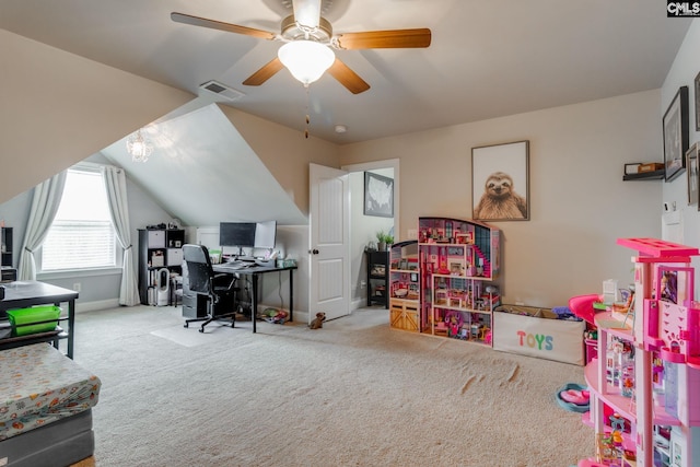 carpeted office space featuring lofted ceiling, visible vents, ceiling fan, and baseboards