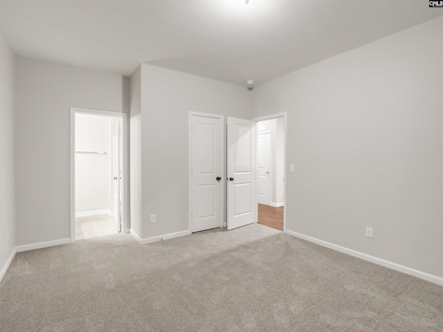 1124 Campbell Ridge Dr, Elgin, SC 29045 - unfurnished bedroom with carpet floors, ensuite bath, and baseboards