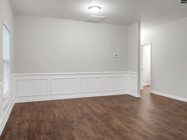 1124 Campbell Ridge Dr, Elgin, SC 29045 - spare room with dark wood-style flooring and visible vents