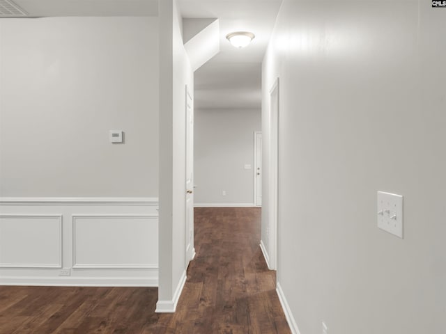 1124 Campbell Ridge Dr, Elgin, SC 29045 - corridor with a wainscoted wall, dark wood-type flooring, and a decorative wall