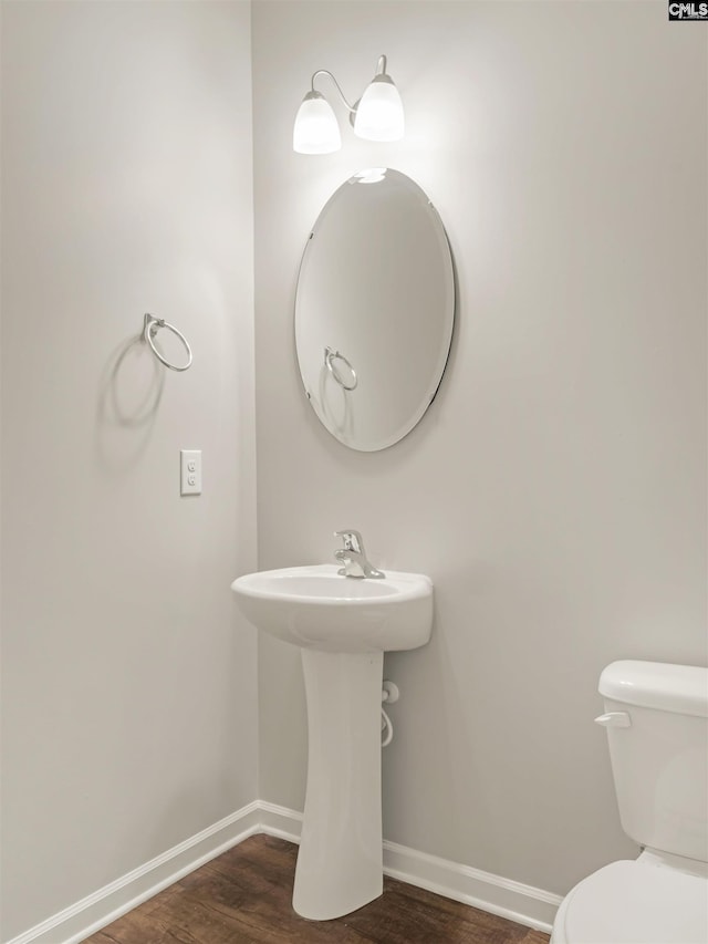1124 Campbell Ridge Dr, Elgin, SC 29045 - half bath with toilet, baseboards, and wood finished floors