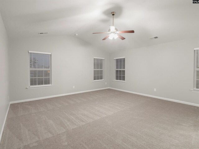 1124 Campbell Ridge Dr, Elgin, SC 29045 - carpeted empty room featuring lofted ceiling, ceiling fan, visible vents, and baseboards