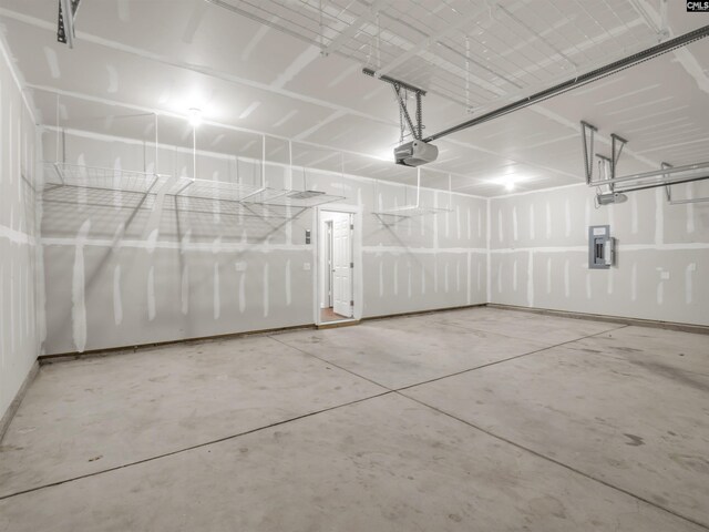 1124 Campbell Ridge Dr, Elgin, SC 29045 - garage with electric panel and a garage door opener
