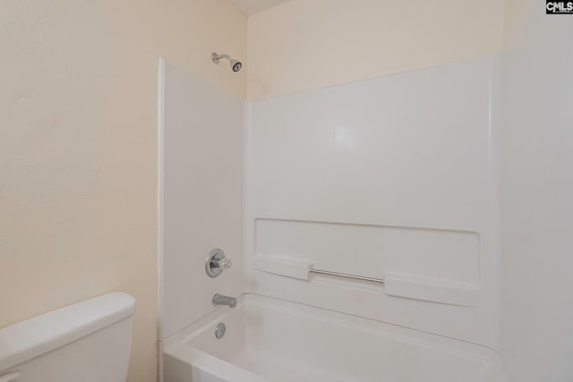 full bath with shower / tub combination and toilet