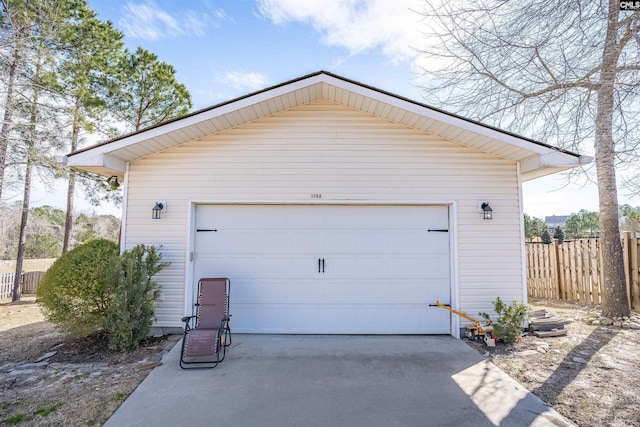 detached garage with fence