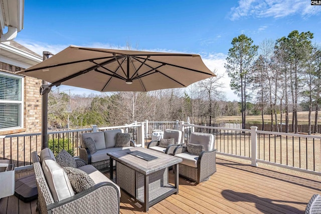 wooden deck featuring outdoor lounge area