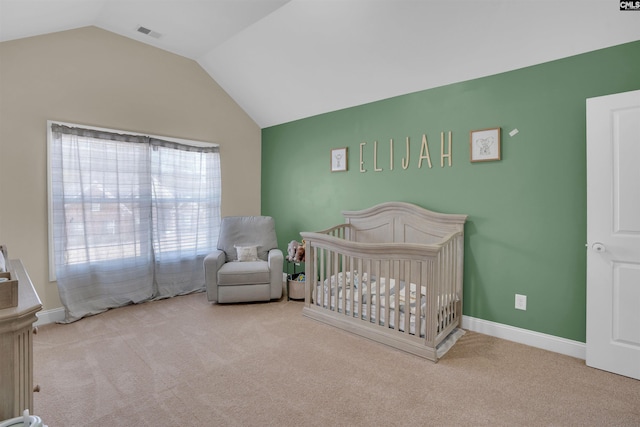 bedroom with lofted ceiling, carpet flooring, visible vents, and baseboards