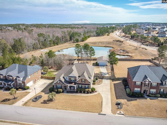 aerial view featuring a residential view and a water view