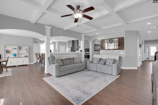 living area featuring beamed ceiling, dark wood-style flooring, coffered ceiling, and baseboards