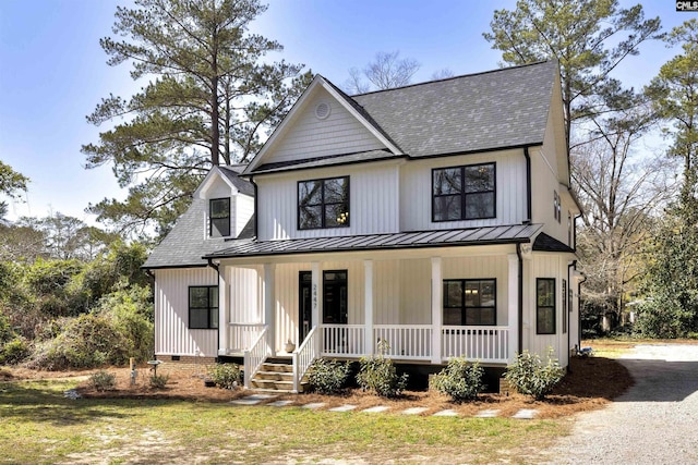 modern farmhouse featuring crawl space, a standing seam roof, metal roof, and a porch