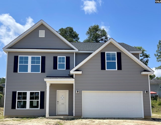 traditional home with an attached garage