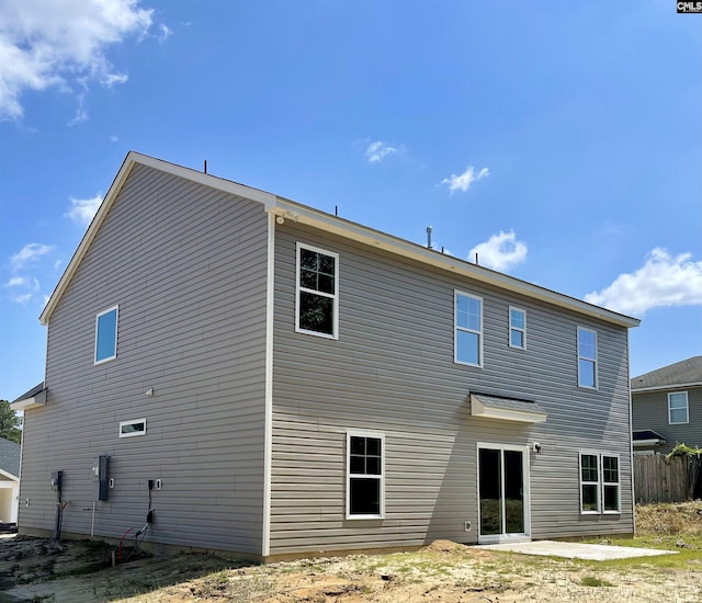 rear view of house featuring a patio
