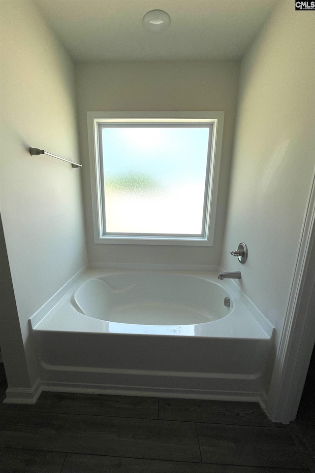 bathroom featuring a bath