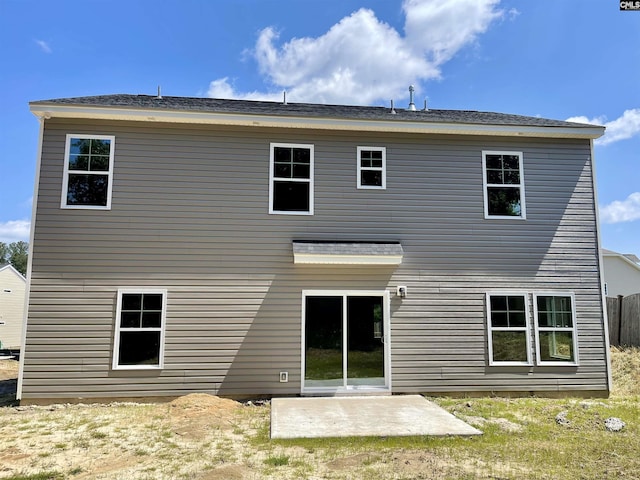 rear view of house featuring a patio area