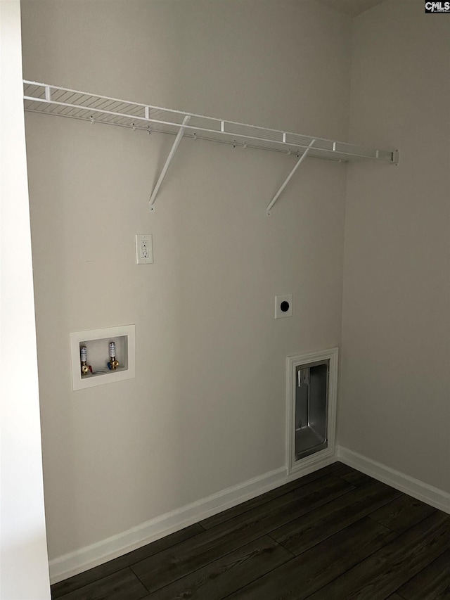 laundry area with dark wood-style flooring, hookup for a washing machine, hookup for an electric dryer, laundry area, and baseboards