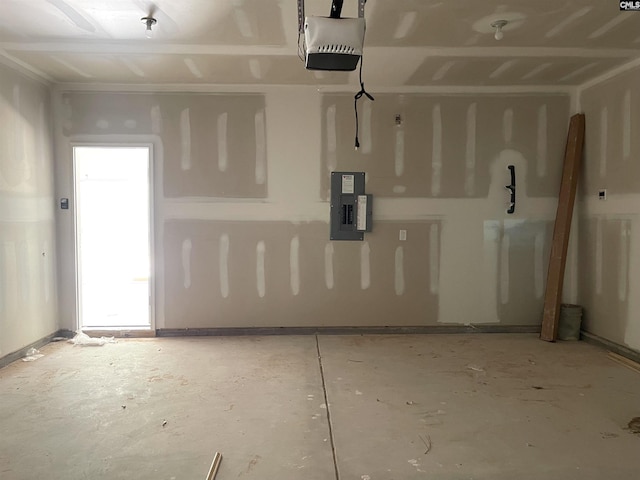 garage with electric panel and a garage door opener