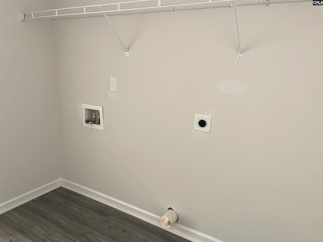 laundry area featuring washer hookup, dark wood-type flooring, electric dryer hookup, laundry area, and baseboards