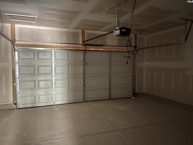 garage featuring a garage door opener