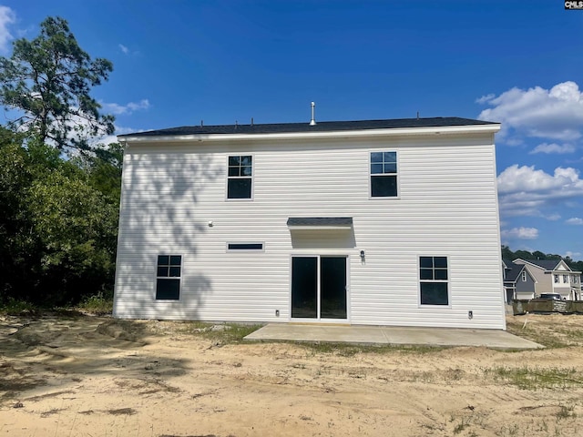 back of property featuring a patio