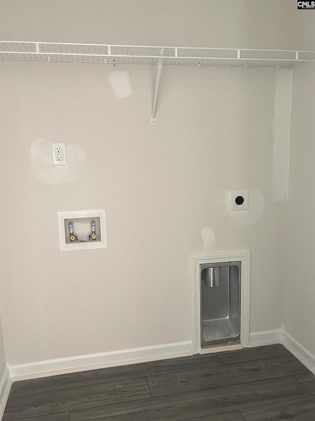 laundry area featuring washer hookup, dark wood-type flooring, electric dryer hookup, laundry area, and baseboards