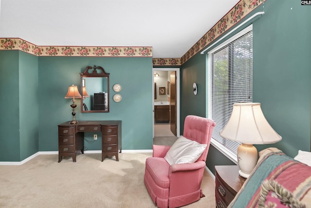 sitting room with carpet floors and baseboards