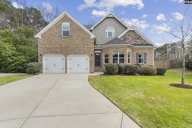 craftsman inspired home featuring an attached garage, brick siding, fence, concrete driveway, and a front lawn