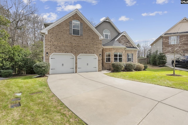 view of front of house featuring driveway, an attached garage, fence, a front lawn, and brick siding