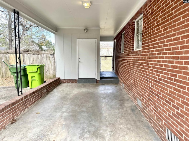 view of patio / terrace featuring fence