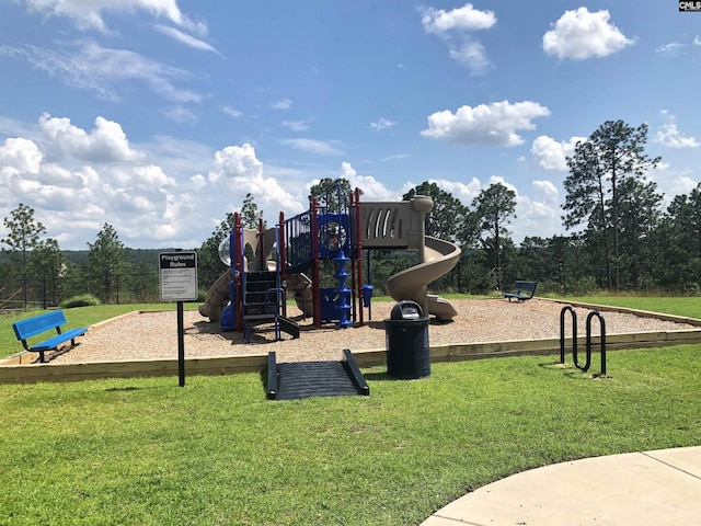 community play area with a yard