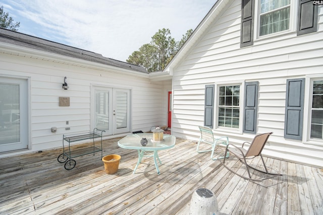 wooden terrace featuring french doors