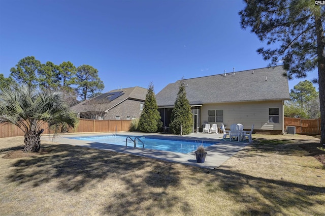 view of pool featuring a fenced in pool, a patio area, a fenced backyard, and central AC unit